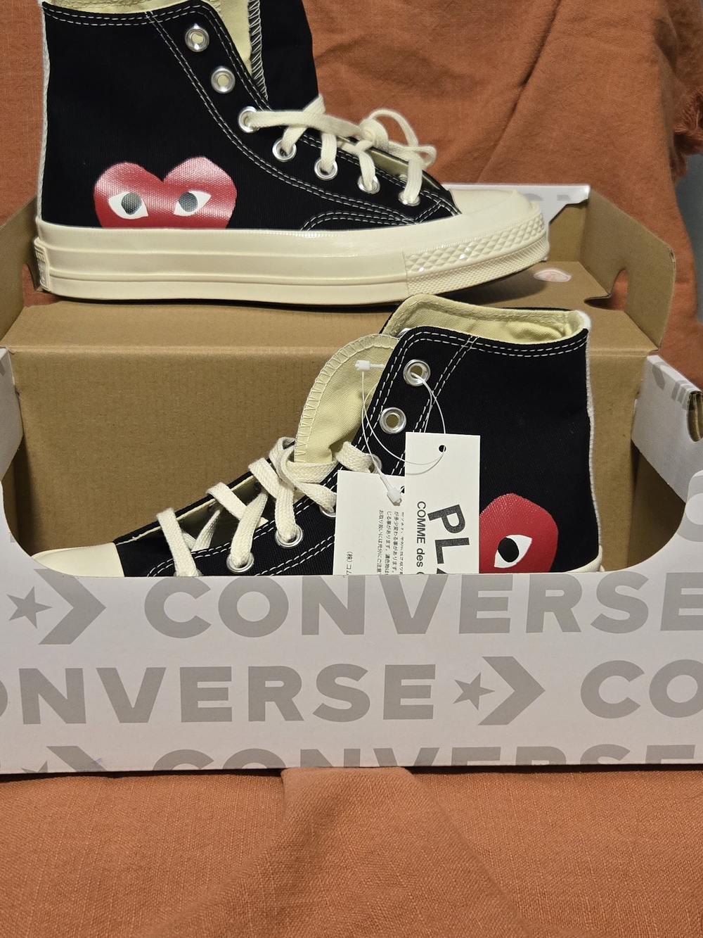 Converse Black High-Top Sneakers with Red Heart
